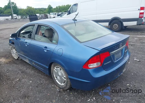 2009 Honda Civic Hybrid from USA, damaged, VIN JHMFA362X9S012707